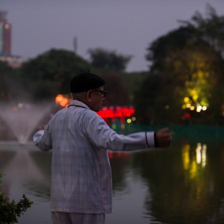 Exercises in the evening, facing the lake. Hanoi, Vietnam. November 2017.